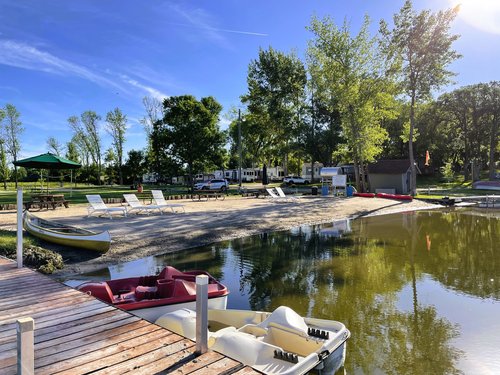 Paddleboats+and+raked+beach+from+dock